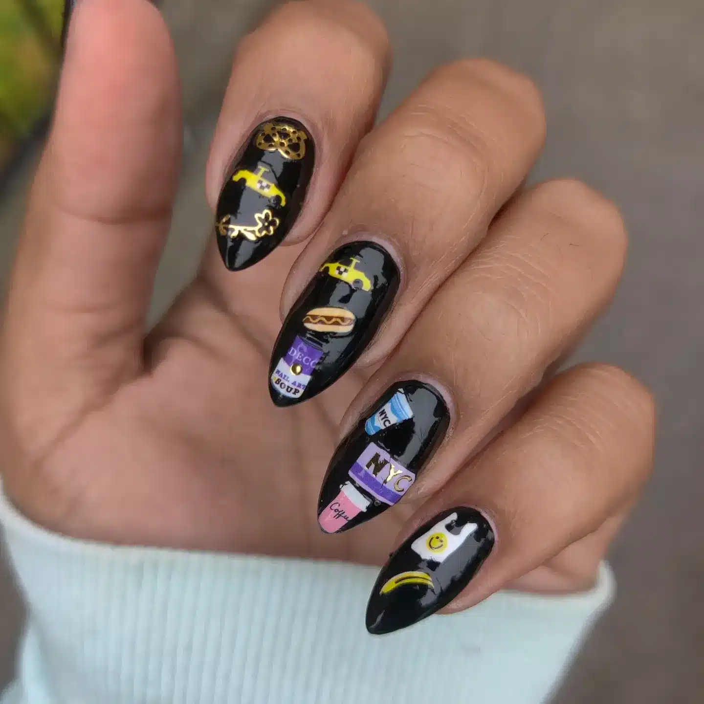 11. NYC Graffiti Black Almond Nails - grunge nail ideas
