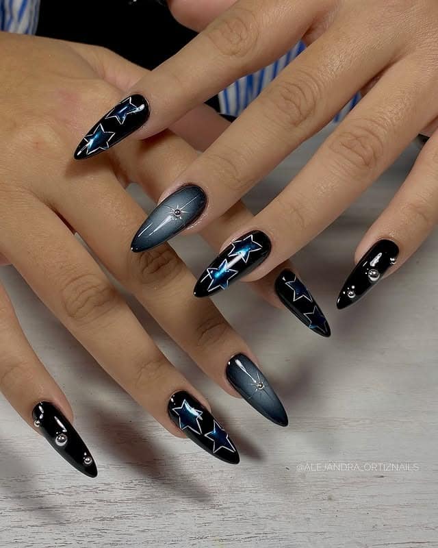 19. Midnight Blue Star Graphic Stiletto Nails - grunge nail ideas