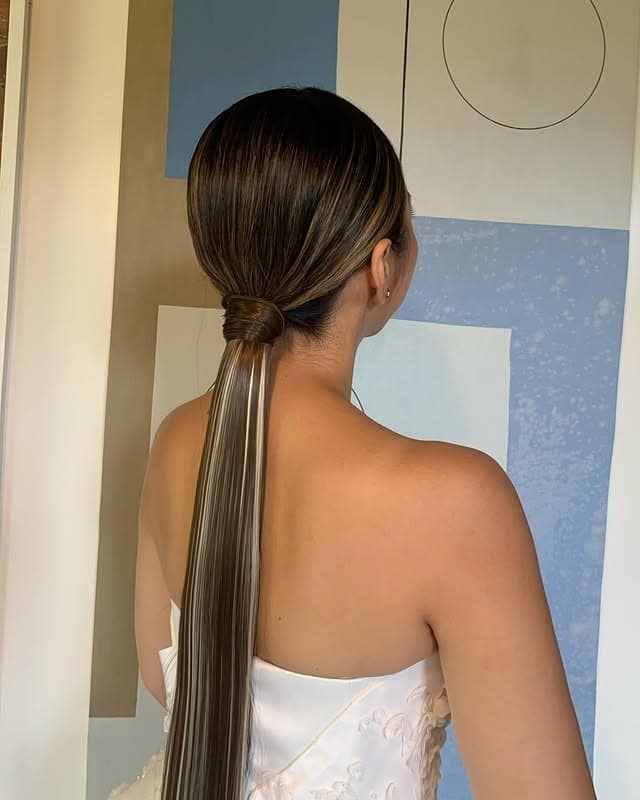 2. Glossy Brunette Low Ponytail with Wrapped Base - Sleek Low Ponytail