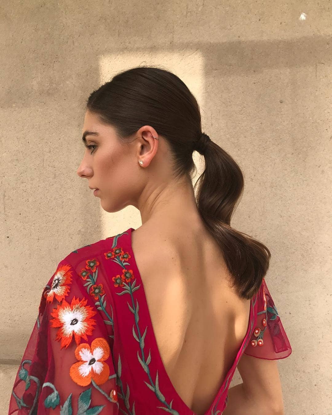 16. Rich Brown Sleek Low Ponytail with Sculpted Lengths - Sleek Low Ponytail
