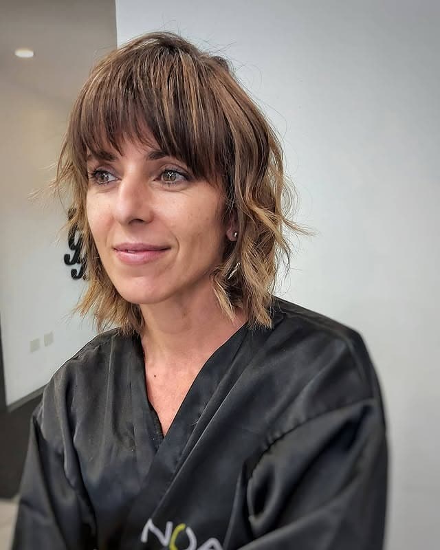 6. Layered Chestnut Shag with Curtain Fringe - Short Shaggy Haircuts
