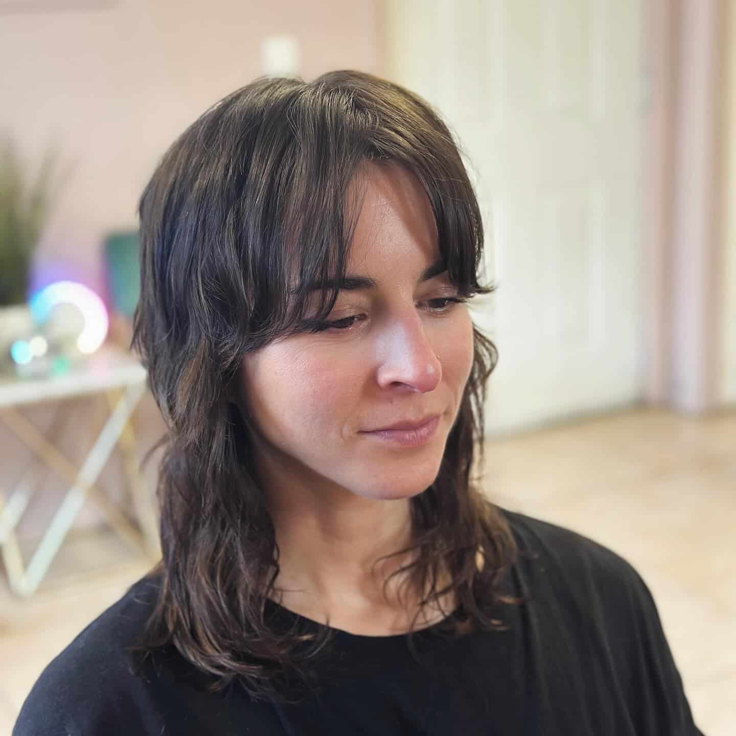 7. Short Brunette Pixie Shag with Choppy Texture - Short Shaggy Haircuts