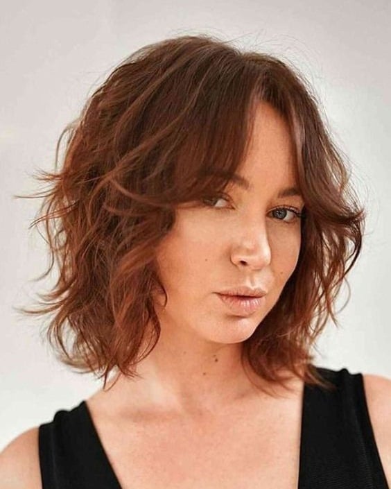 11. Soft Copper Wavy Shag with Curtain Fringe - Short Shaggy Haircuts
