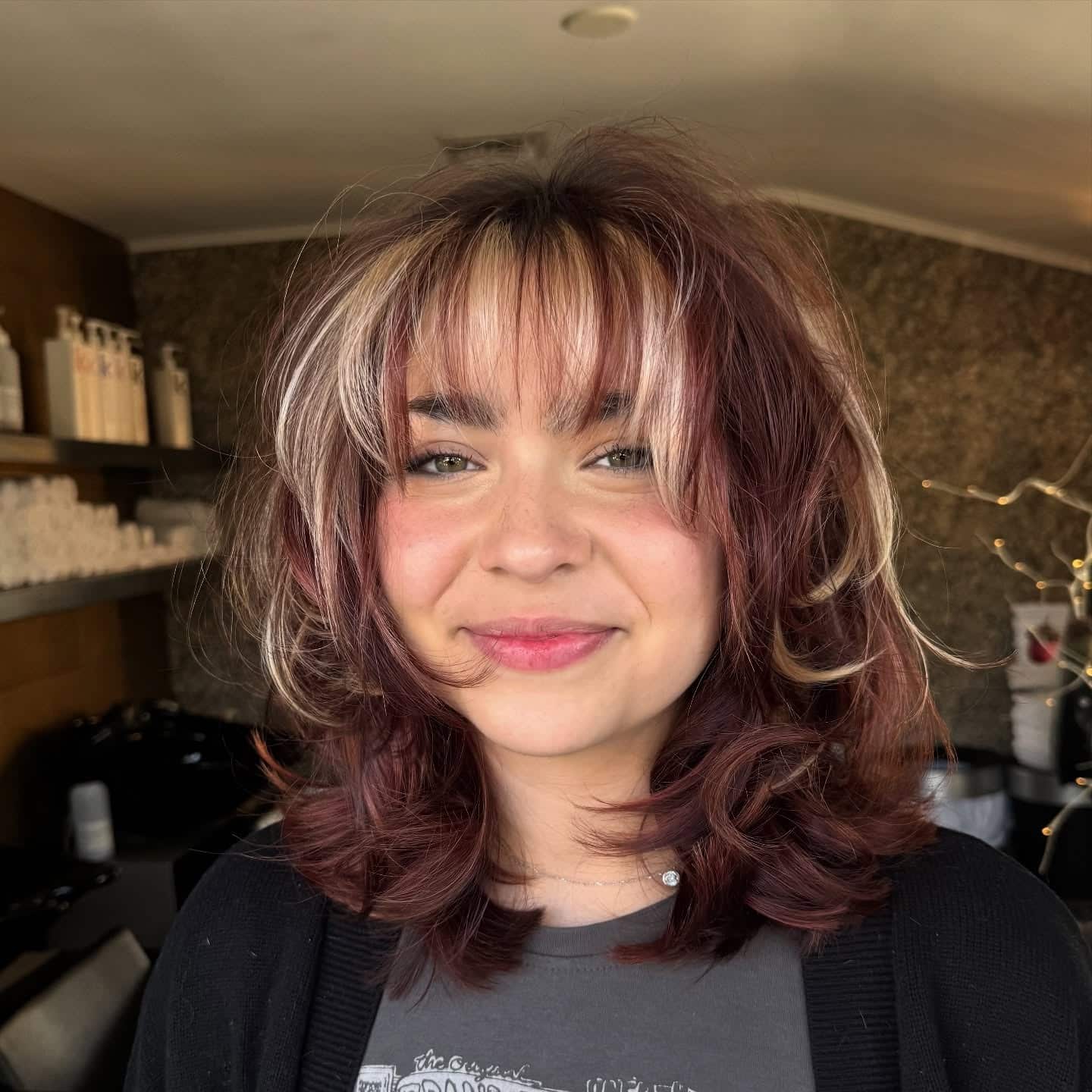 15. Burgundy Layered Shag with Face-Framing Highlights - Short Shaggy Haircuts