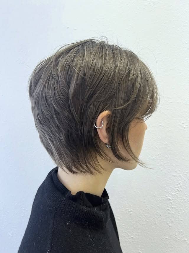 21. Ash Brown Tapered Pixie Shag with Nape Graduation - Short Shaggy Haircuts