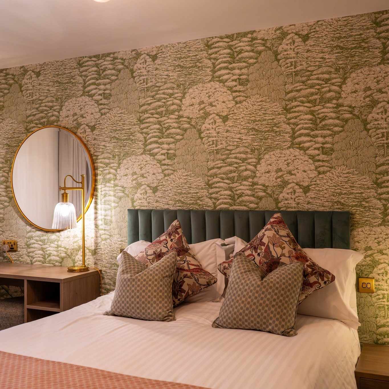 1. Botanical Green Retreat with Brass Accents - spa style bedroom ideas