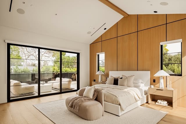 6. Modern Minimal Bedroom with Warm Wood Walls - spa style bedroom ideas