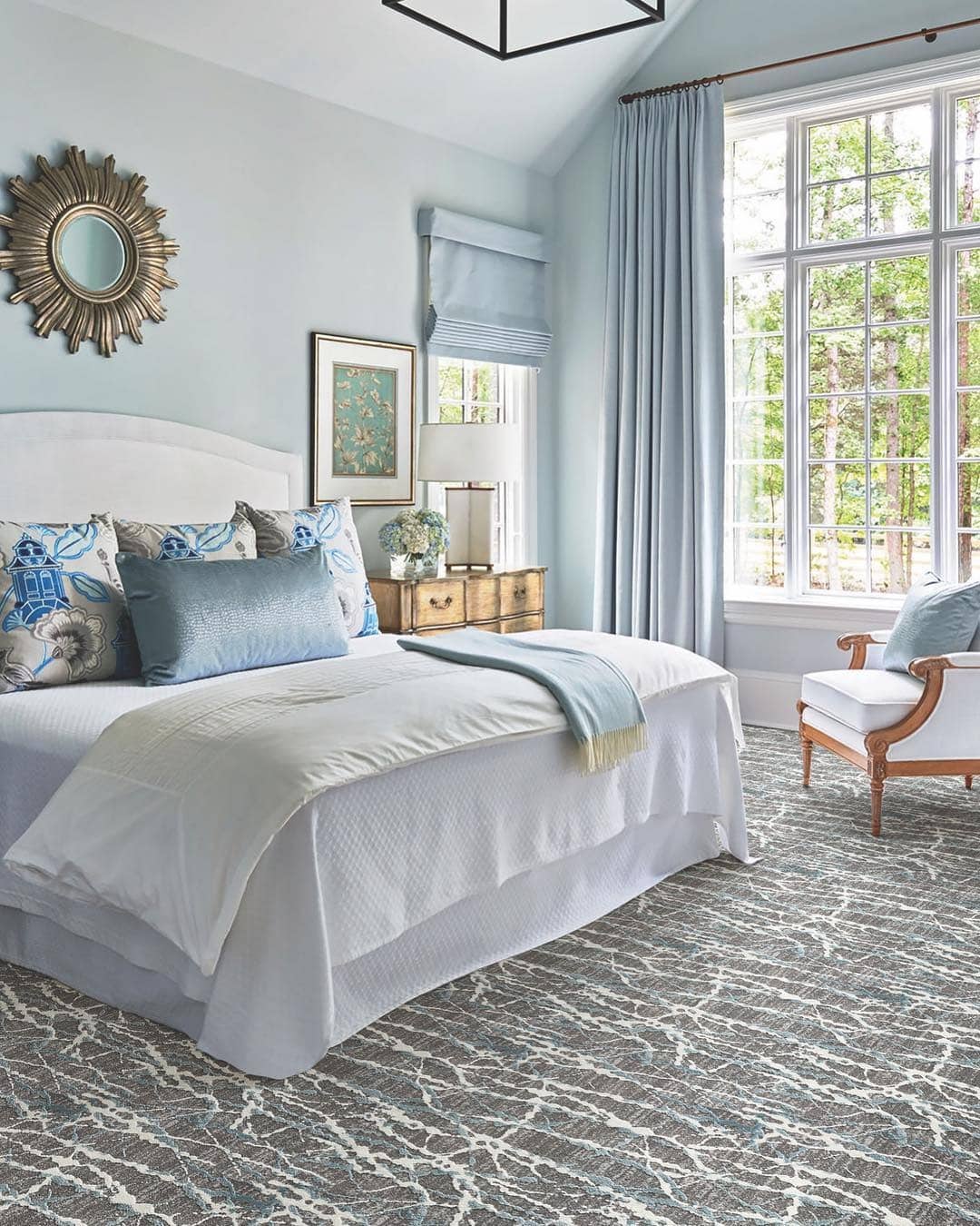 10. Light Blue Tranquil Bedroom with Soft Textures - spa style bedroom ideas