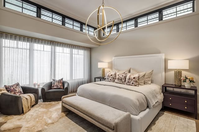 11. Soft Beige Luxe Bedroom with Sculptural Lighting - spa style bedroom ideas