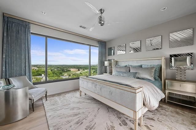 19. Soft Gray Bedroom with Panoramic Window Views - spa style bedroom ideas