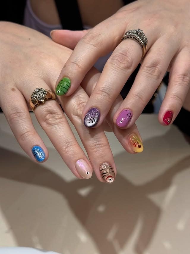 13. Playful Multicolor Abstract Short Nails - short nail ideas