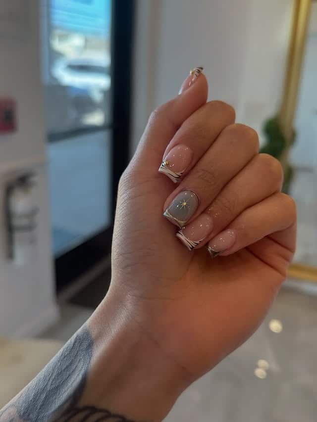 15. Nude Short Nails with Modern French and Star Accent - short nail ideas