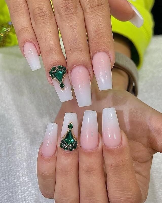 2. Milky Ombre Coffin Nails with Emerald Crystal Accents - nail ideas for wedding