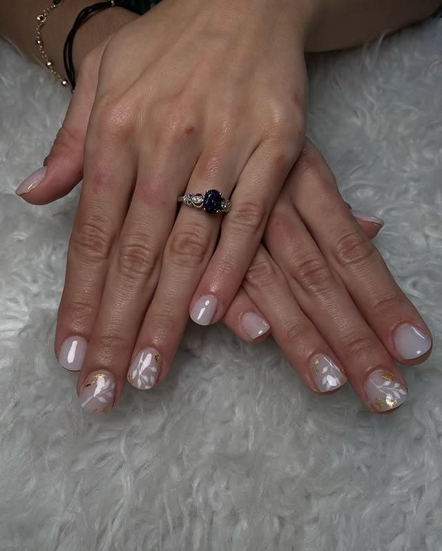 11. Short Nude Nails with Gold Foil and Floral Accent - nail ideas for wedding