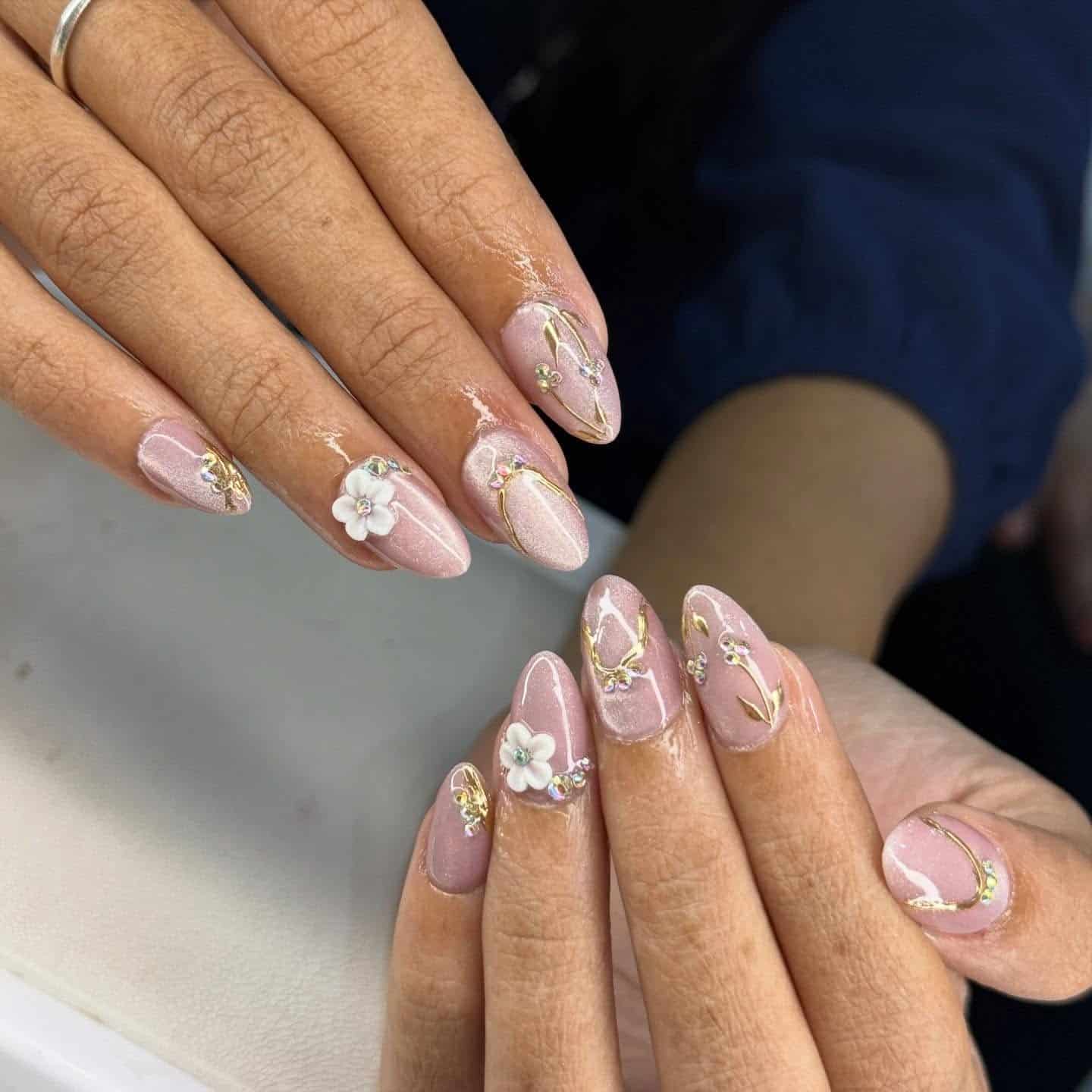 20. Soft Pink Shimmer Almond Nails with 3D Floral and Gold Accents - nail ideas for wedding