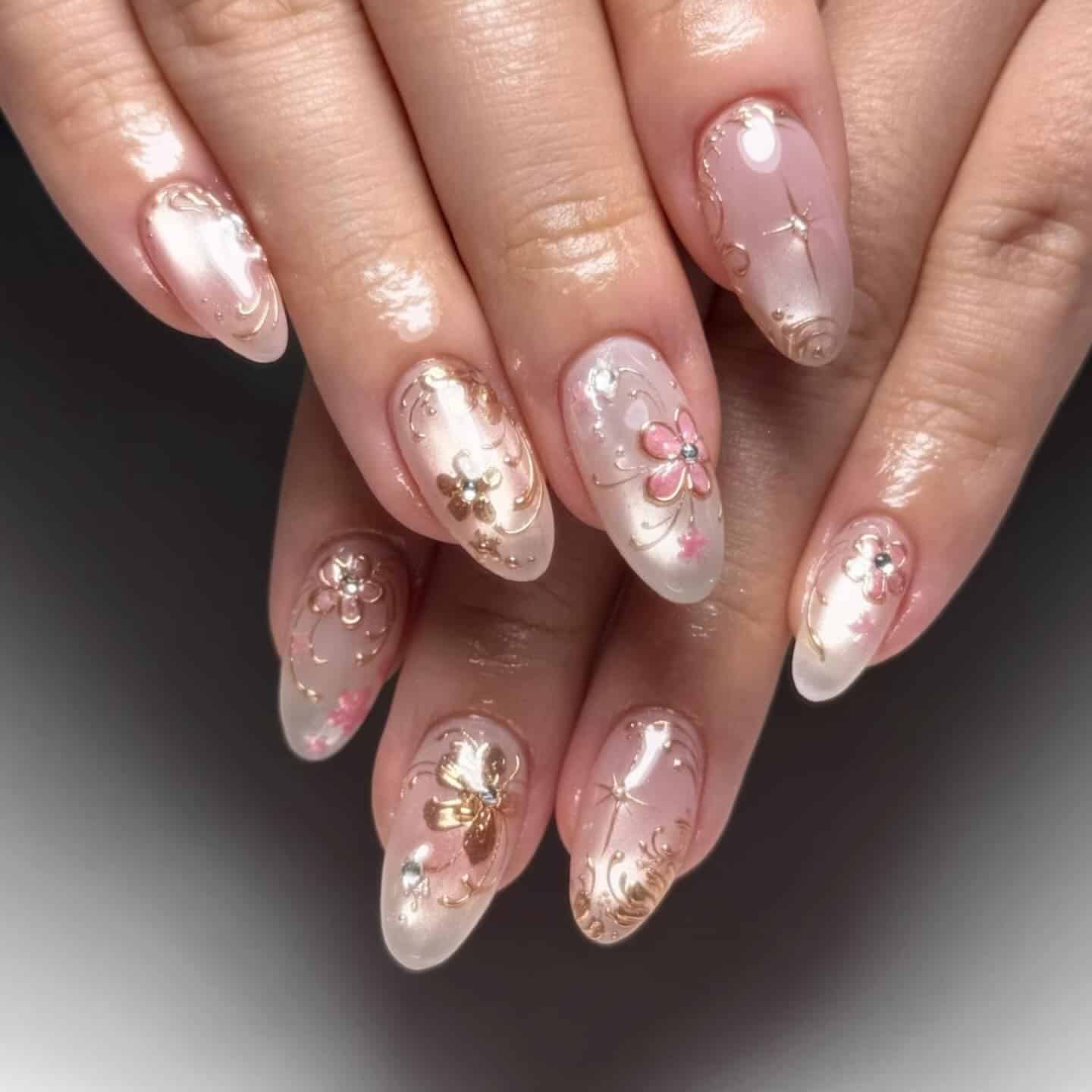 22. Blush Pink Chrome Almond Nails with Gold Floral Art - nail ideas for wedding