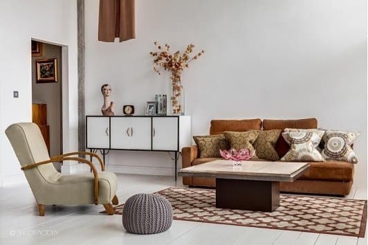 9. Minimalist Brown Sofa with Classic Neutral Styling - brown sofa living room ideas