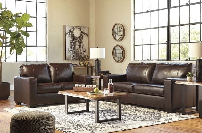 15. Classic Brown Leather Seating with Black Window Frames - brown sofa living room ideas