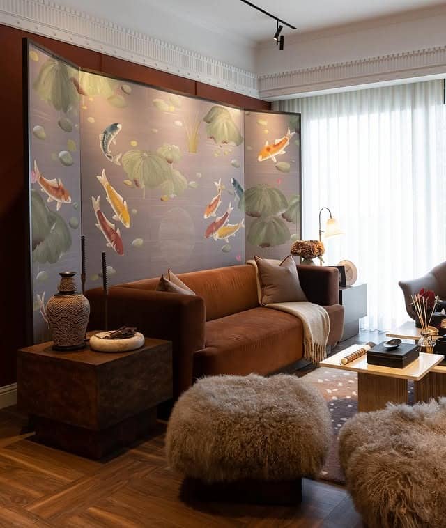21. Artistic Brown Sofa with Koi-Inspired Mural and Soft Neutrals - brown sofa living room ideas