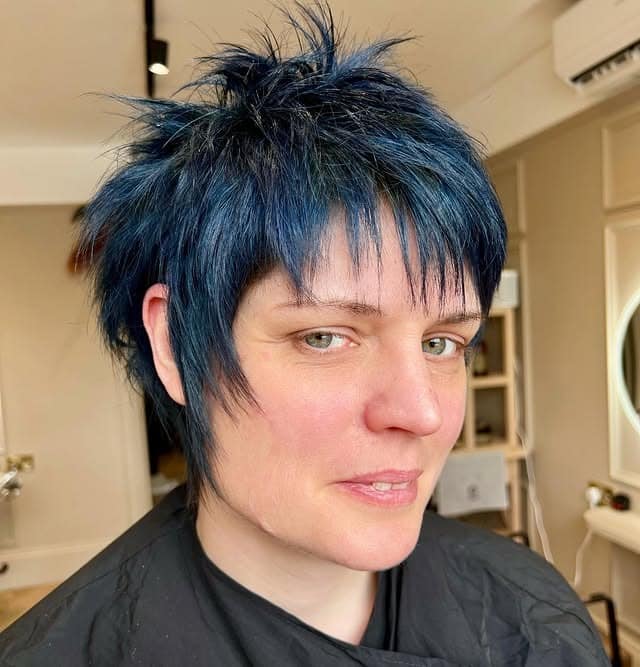 9. Spiky Razor Pixie with Midnight Blue Accents - Razor Cut Hairstyles