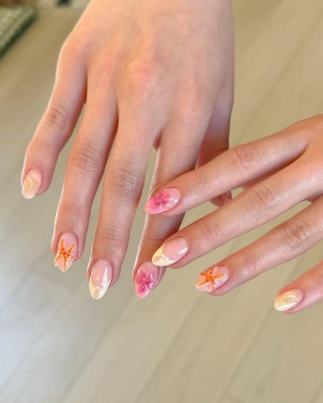 11. Soft Nude Almond Nails with Hand-Painted Pink and Orange Florals - summer nail ideas