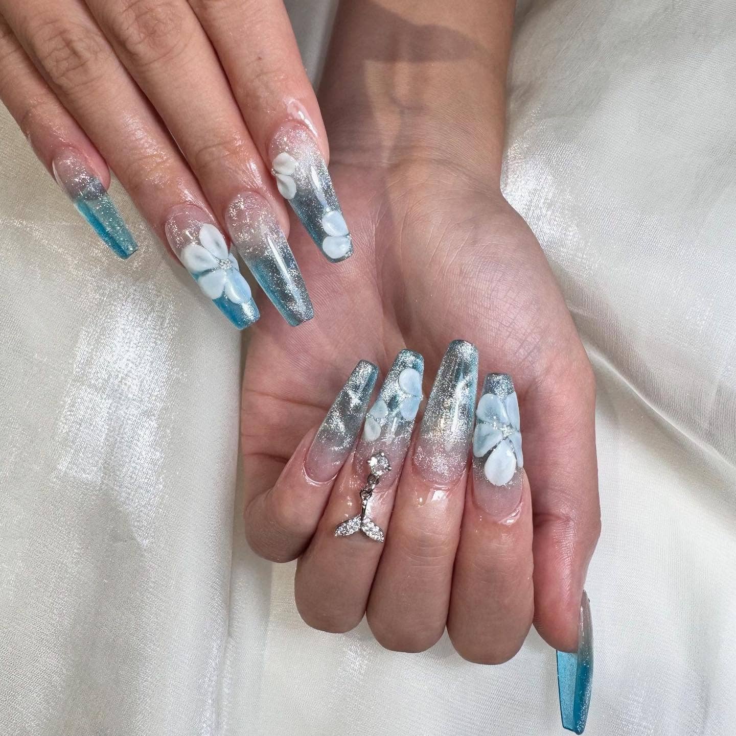 18. Blue Ombre Glitter Coffin Nails with 3D Floral Design - summer nail ideas