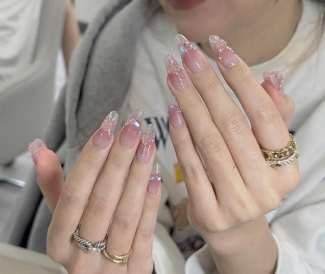 19. Clear Pink Almond Nails with 3D Gel Texture and Crystal Details - summer nail ideas