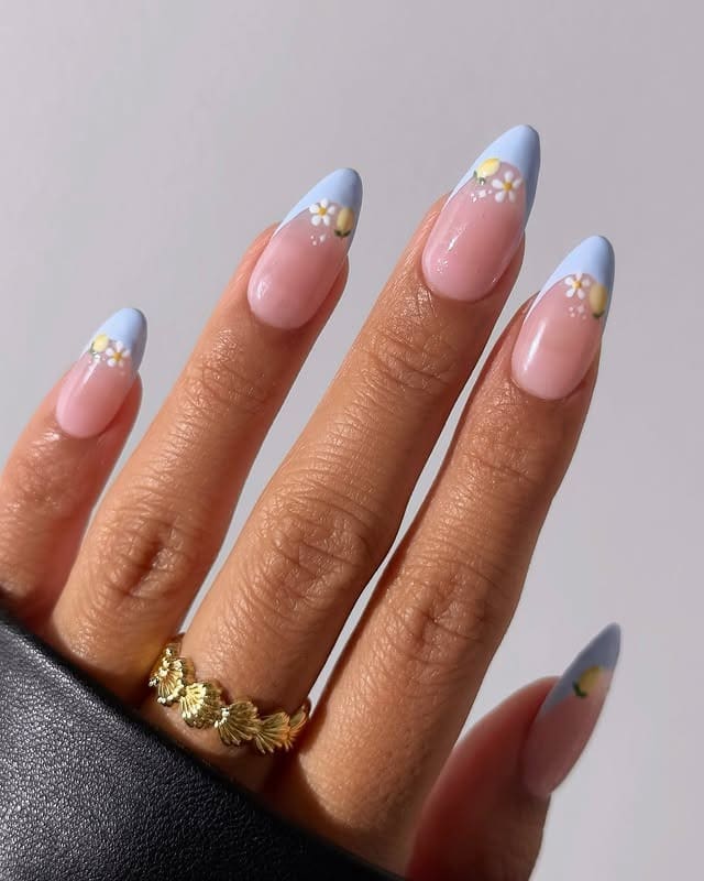 20. Baby Blue French Tip Almond Nails with Daisy Accents - summer nail ideas