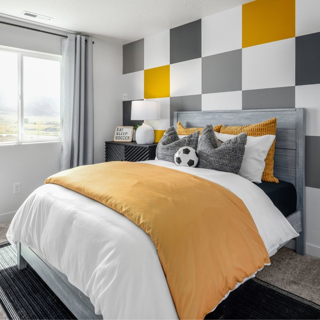 8. Geometric Soccer Color Block Bedroom in Gray and Yellow - soccer bedroom ideas