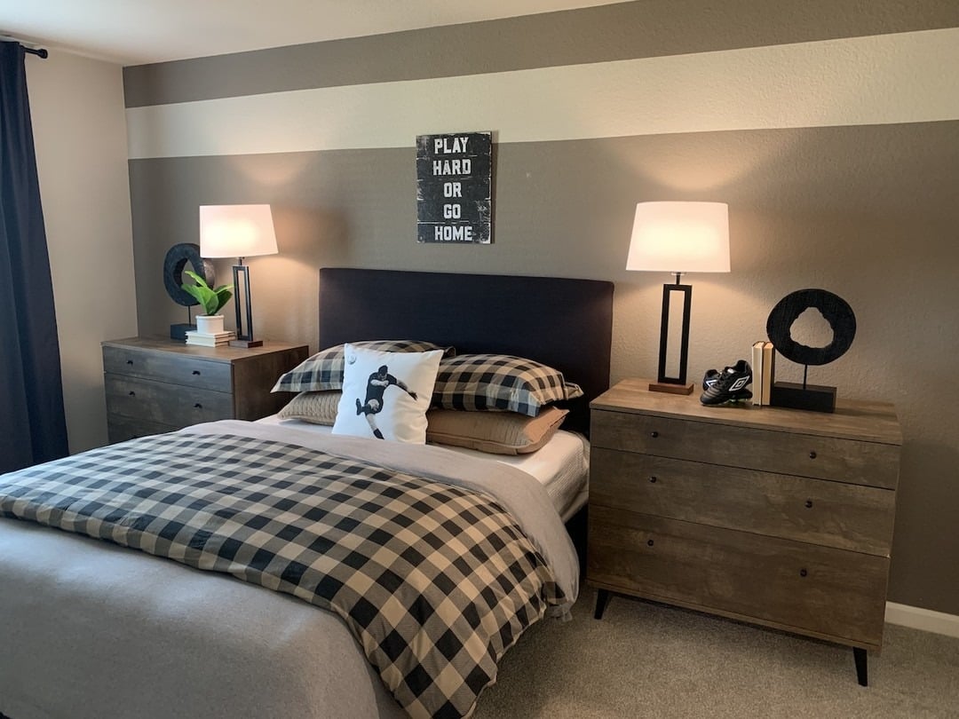 10. Classic Soccer-Inspired Bedroom with Plaid Textiles - soccer bedroom ideas