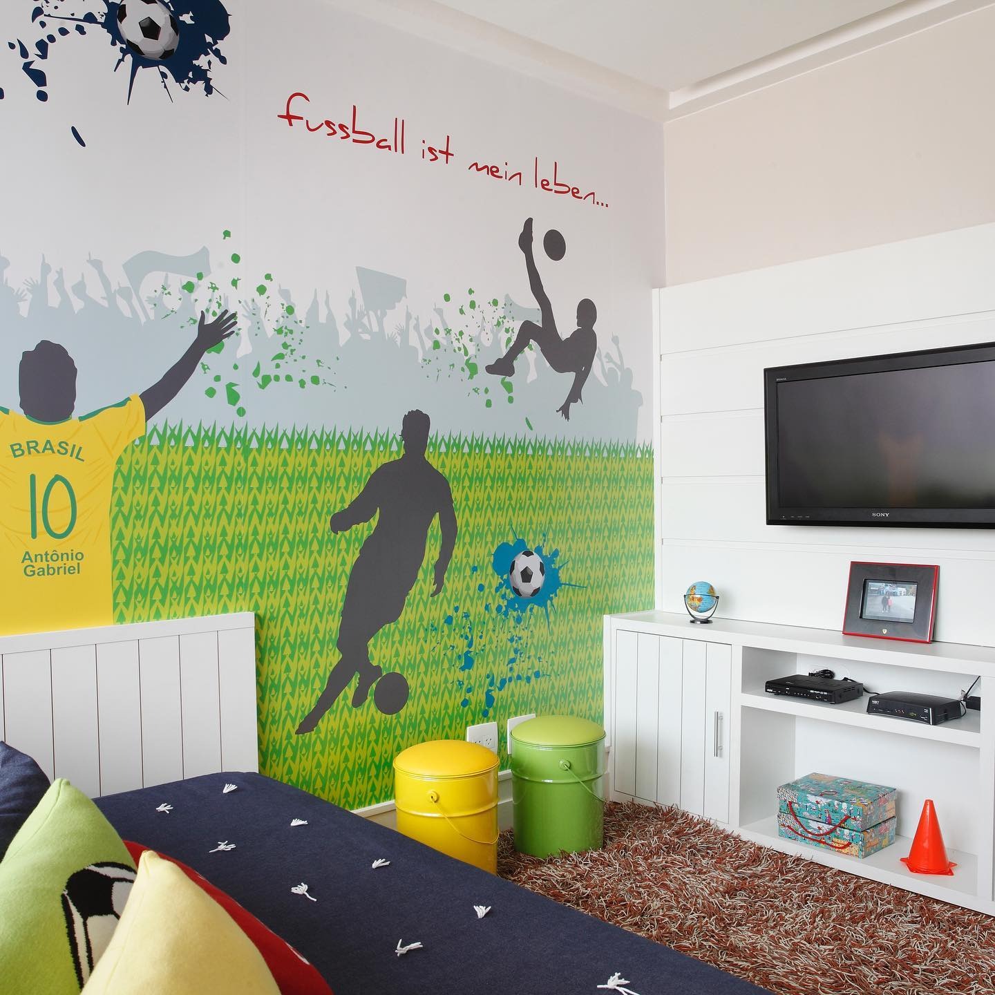 13. Playful Soccer Mural Bedroom in Green and Yellow - soccer bedroom ideas