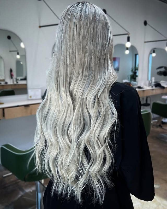 2. Icy Platinum Ash Waves with Root Melt - Ash Platinum Hair Color