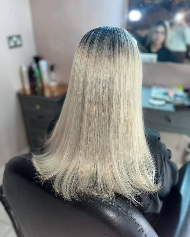 12. Sleek Ice Ash Platinum Blunt Lob - Ash Platinum Hair Color