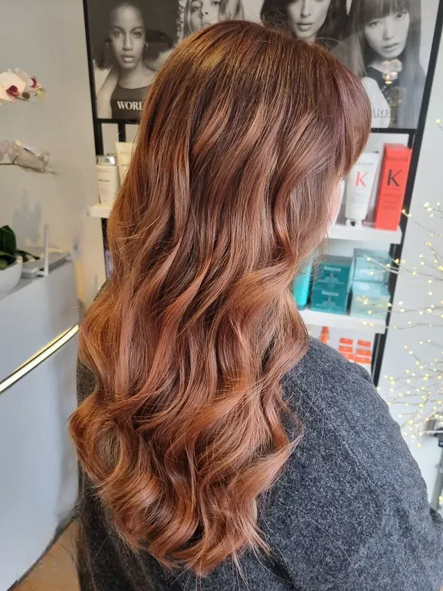 5. Copper-Infused Chestnut Waves with Face-Framing Layers - Warm Chestnut Hair Color