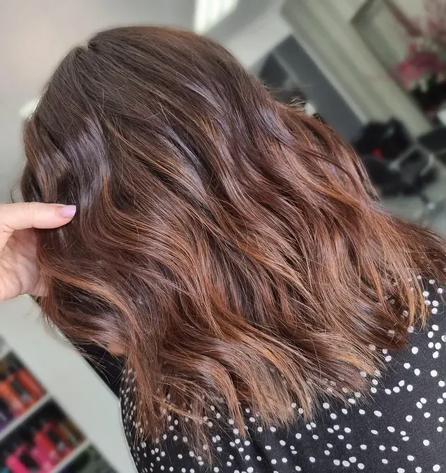 10. Shoulder-Length Waves with Warm Chestnut Accents - Warm Chestnut Hair Color