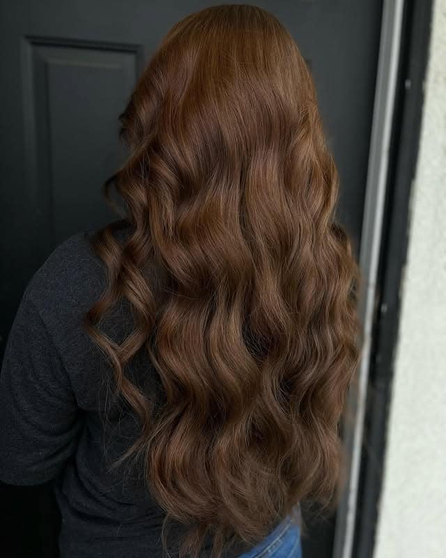 22. Cascading Soft Waves in Rich Warm Chestnut - Warm Chestnut Hair Color