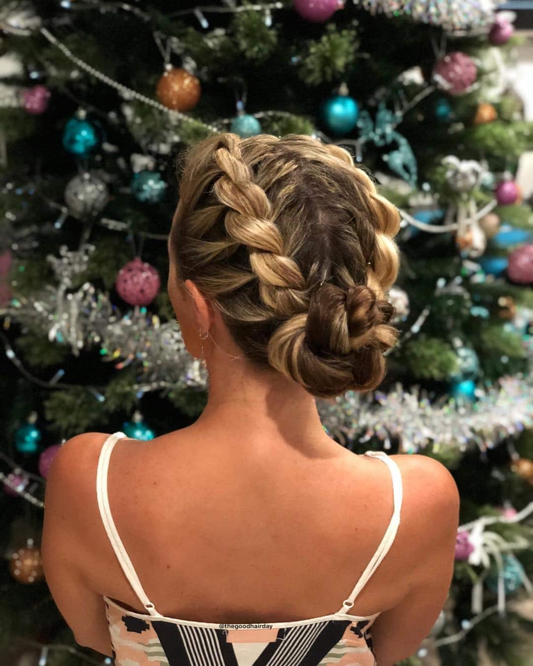 3. Highlighted Brunette Rope Halo into Twisted Low Bun - Rope Braid Hairstyles