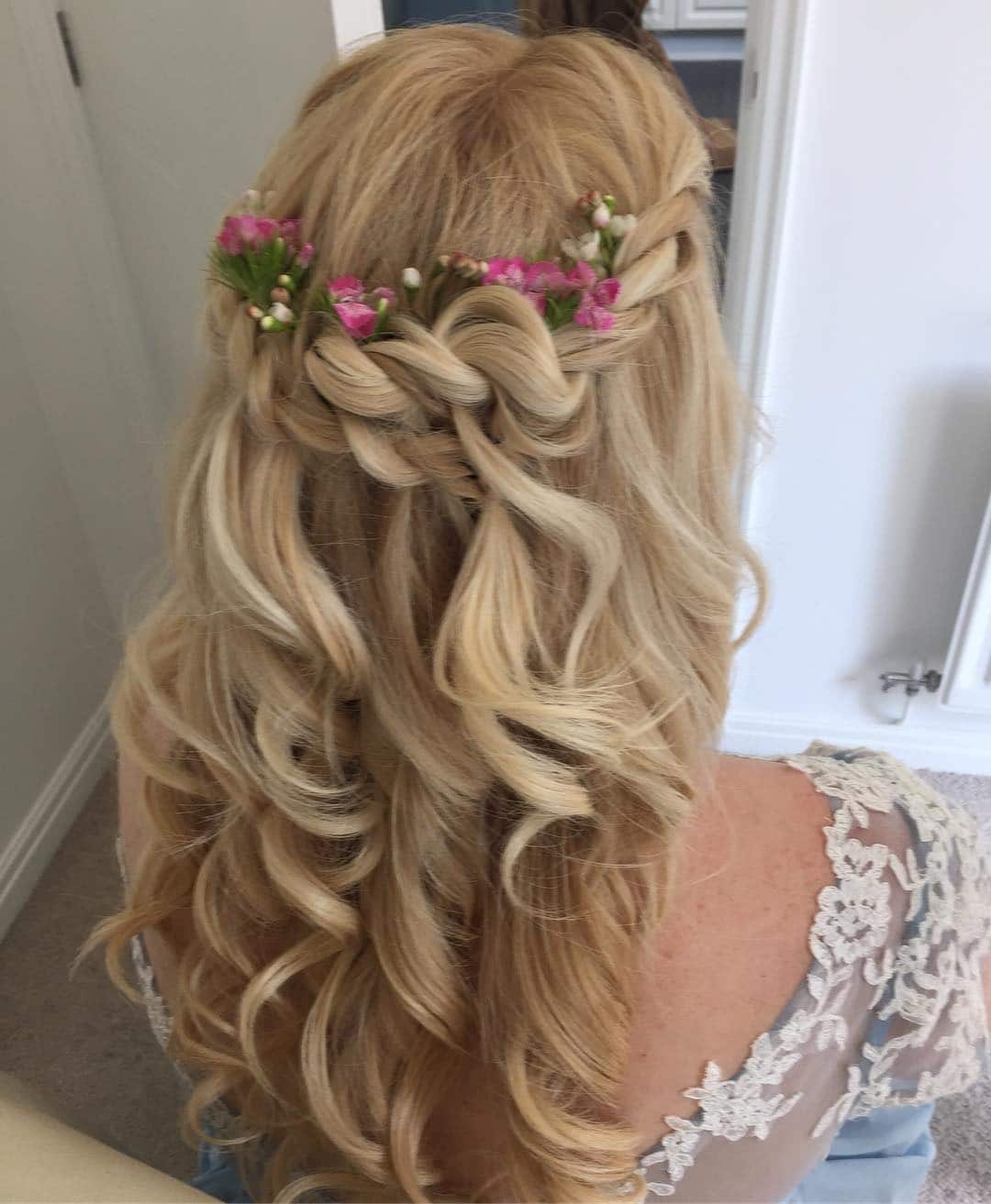 13. Golden Blonde Rope Braid Crown with Floral Accents - Rope Braid Hairstyles