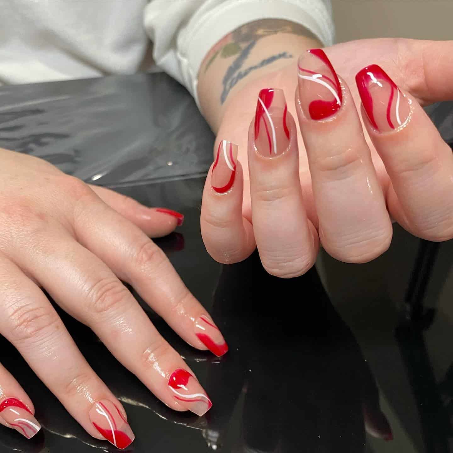 13. Red Abstract French Coffin Nails - small coffin nail ideas