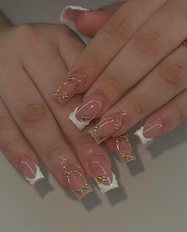 21. Nude French Coffin Nails with Gold Embellished Accents - small coffin nail ideas
