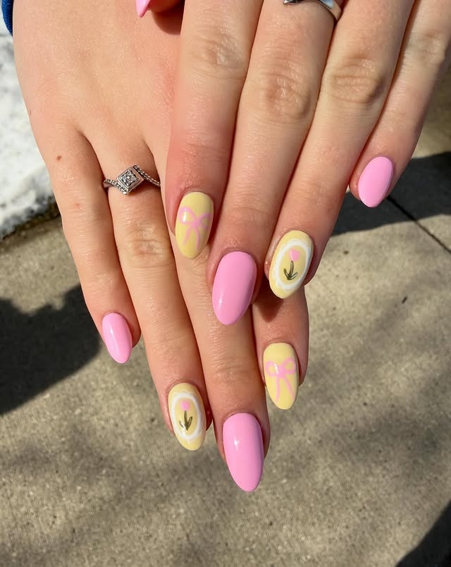 14. Pink and Butter Yellow Almond Nails with Minimal Floral Motifs - yellow and pink nail ideas