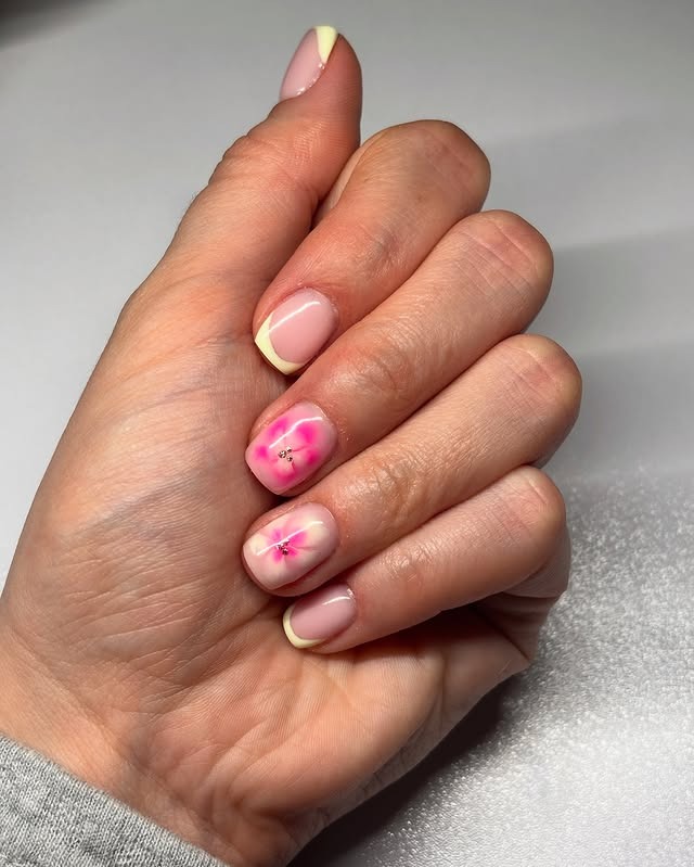 15. Short Square Pink Nails with Yellow French Tips and Bloom Accents - yellow and pink nail ideas