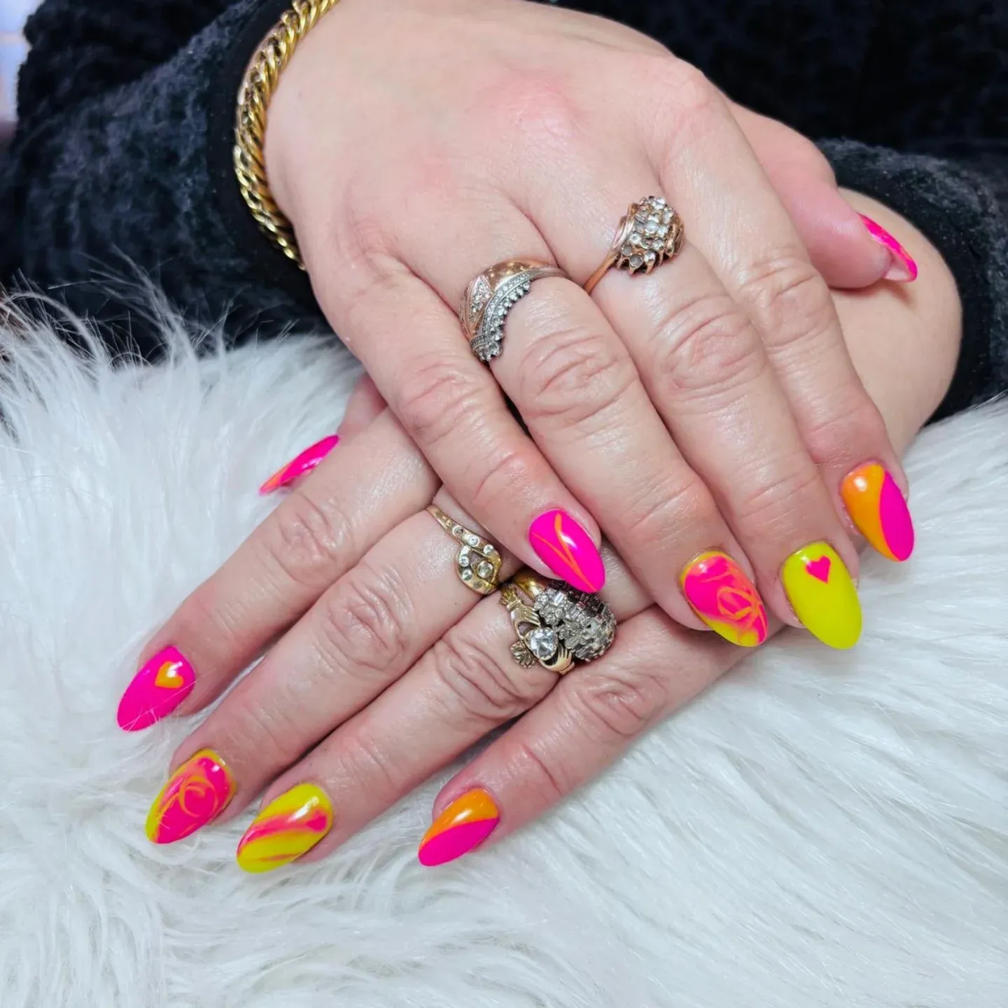 16. Neon Pink and Yellow Almond Nails with Swirl Art and Heart Details - yellow and pink nail ideas