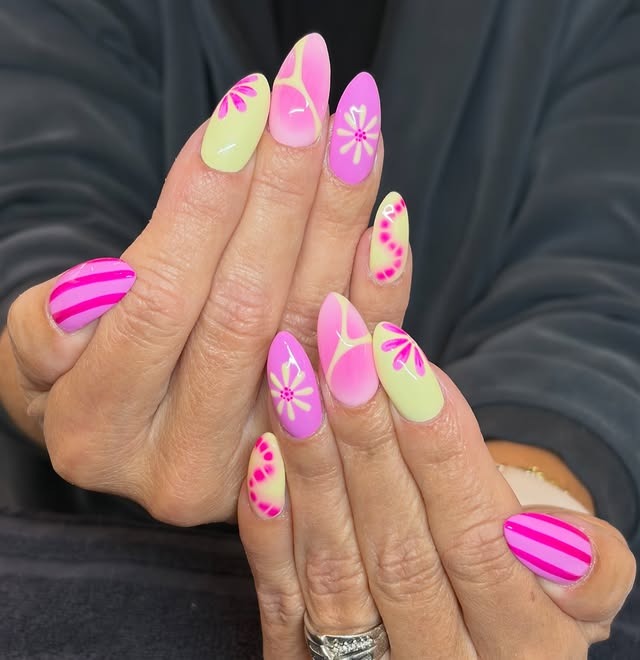 17. Mixed Pink and Lime Yellow Almond Nails with Graphic Floral Patterns - yellow and pink nail ideas