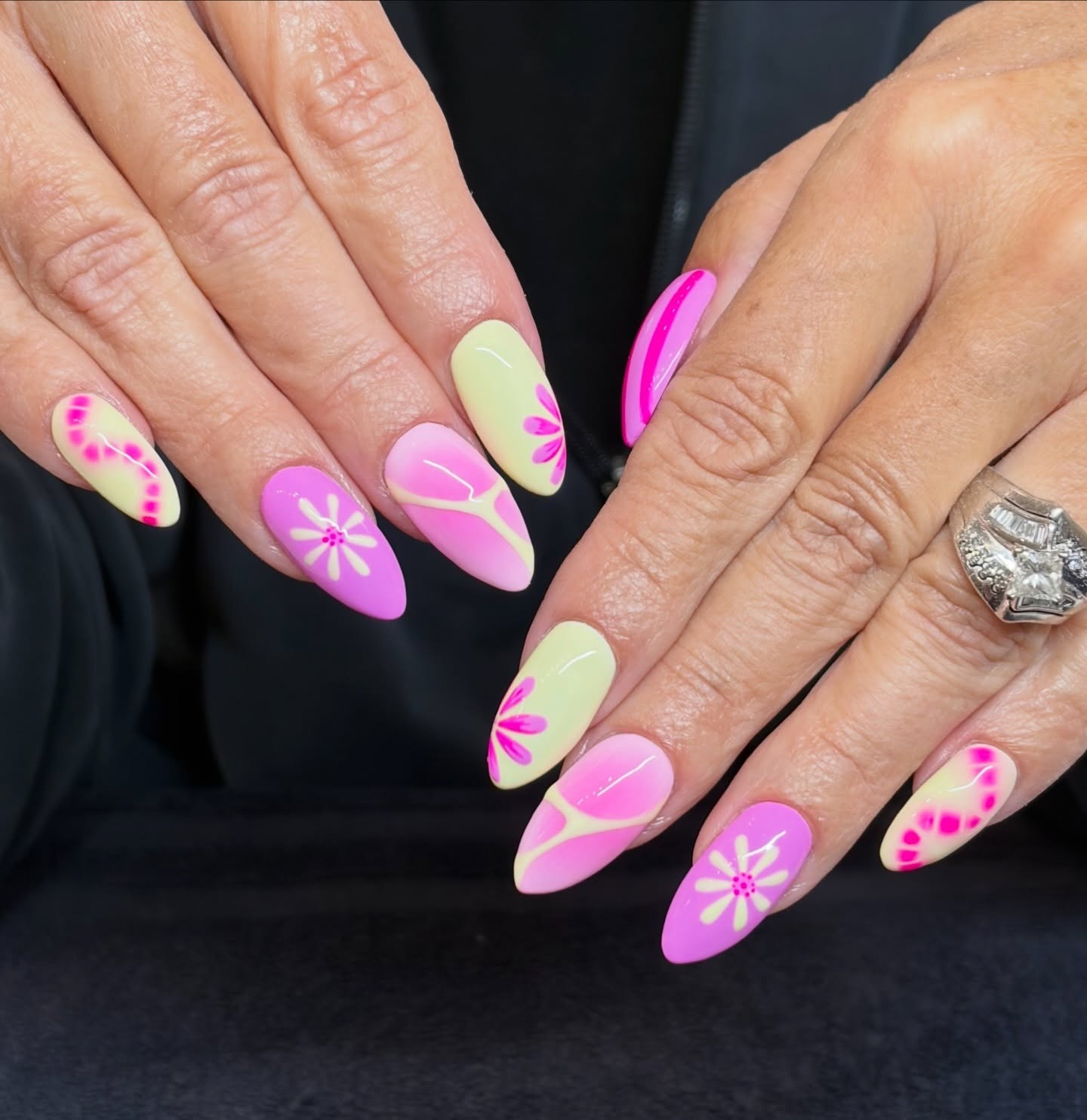 18. Matte Pink and Yellow Almond Nails with Daisy and Abstract Designs - yellow and pink nail ideas