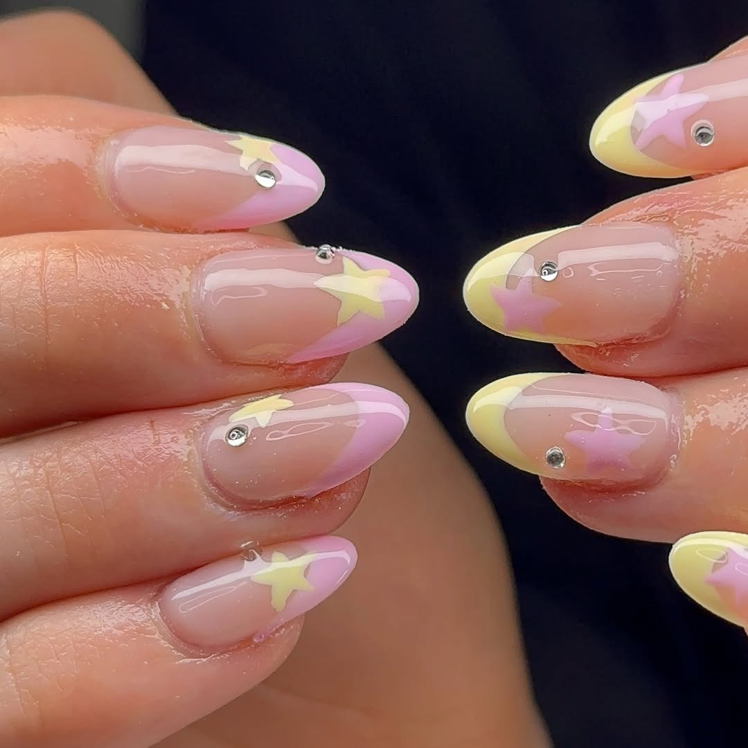 21. Pink and Yellow Star French Almond Nails with Rhinestone Accents - yellow and pink nail ideas