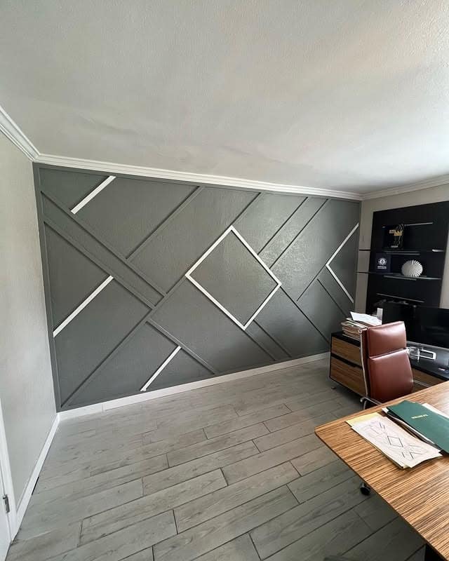 16. Gray Geometric Accent Wall with Contrasting Trim - accent wall office ideas