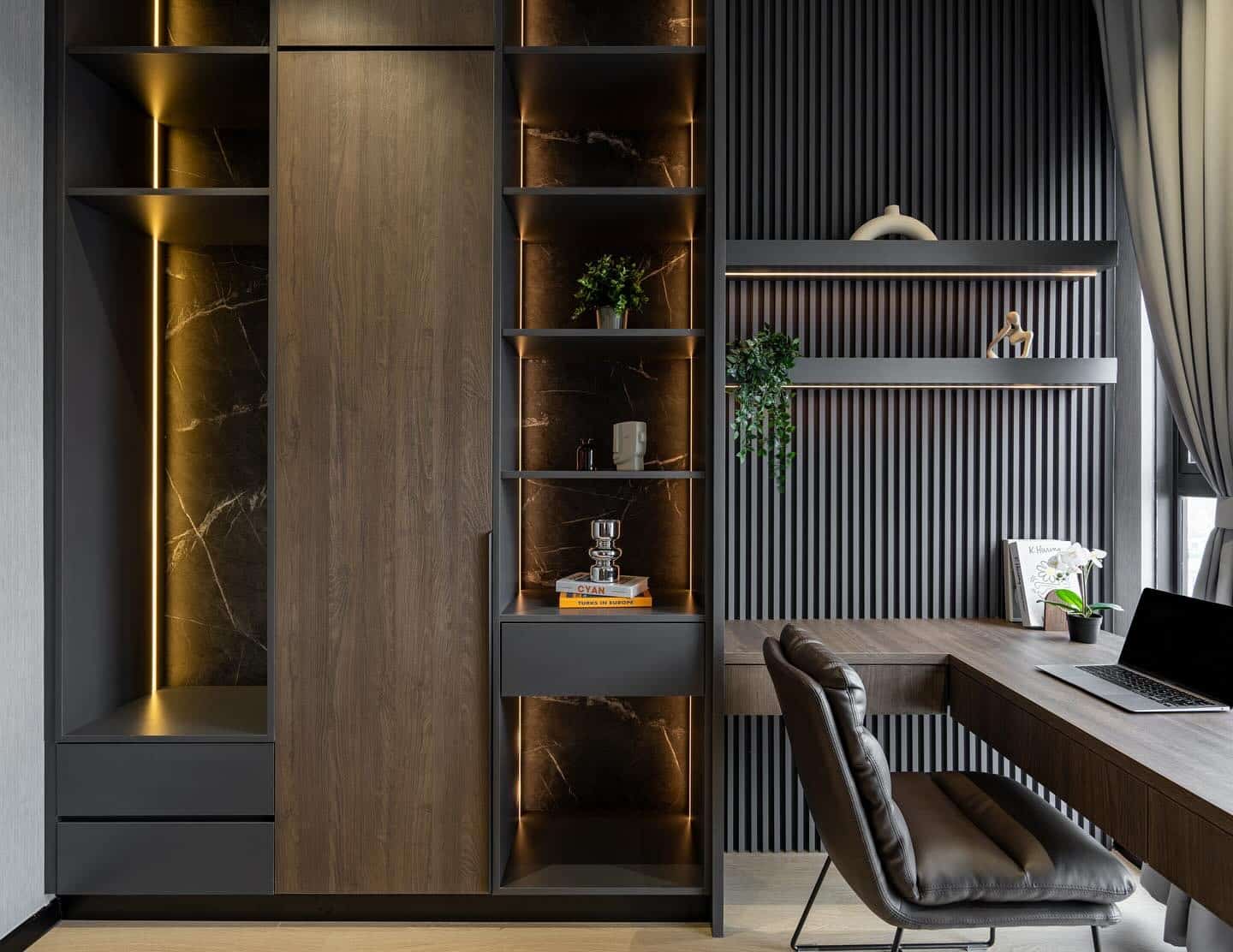20. Modern Dark Slat Accent Wall with Integrated Lighting - accent wall office ideas