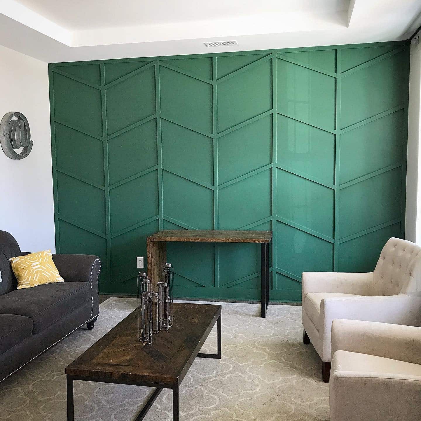 22. Emerald Green Geometric Accent Wall with Modern Trim - accent wall office ideas