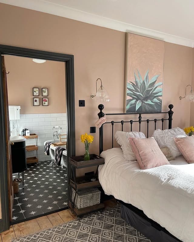 8. Warm Beige and Pink Bedroom with Black Iron Bed Frame - black and pink bedroom ideas